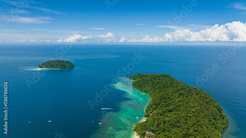 Top view of tropical islands and beautiful beach. Tunku Abdul Rahman National Park. Manukan and Sulug islands. Kota Kinabalu, Sabah, Malaysia.