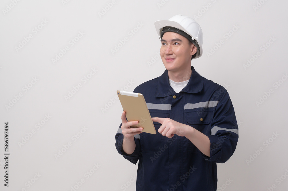 Portrait of male engineer wearing a protective helmet over white background studio. Portrait of male engineer wearing a protective helmet over white background studio.