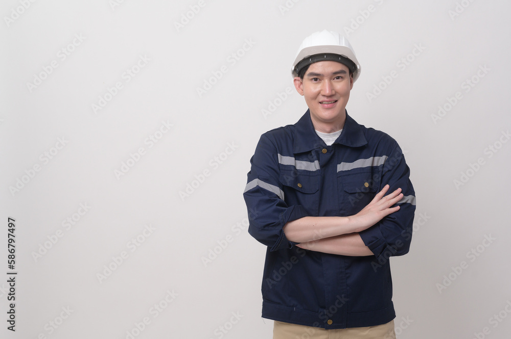 Portrait of male engineer wearing a protective helmet over white background studio. Portrait of male engineer wearing a protective helmet over white background studio.