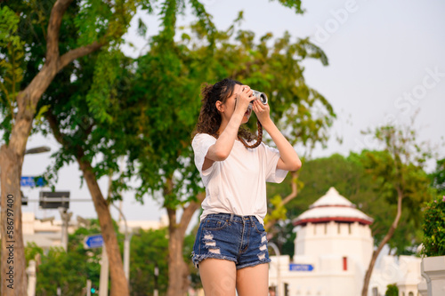 Beautiful young Asian tourist woman on vacation sightseeing and exploring Bangkok city, Thailand, Holidays and traveling concept © tonefotografia