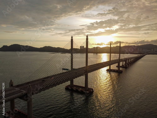 Aerial view silhouette Penang Second Bridge during sunset