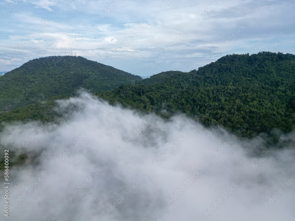 Aerial view cloud move at forest at hill in Malaysia