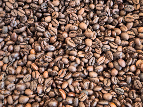 Coffee beans texture background. Brown roasted coffee beans. pattern. Closeup shot of coffee beans.