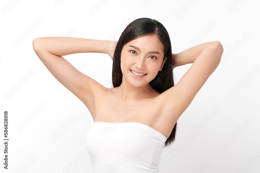 Beautiful Young Asian woman lifting hands up to show off clean and hygienic armpits or underarms on white background, Smooth armpit cleanliness and protection concept Beautiful Young Asian woman lifting hands up to show off clean and hygienic armpits or underarms on white background, Smooth armpit cleanliness and protection concept
