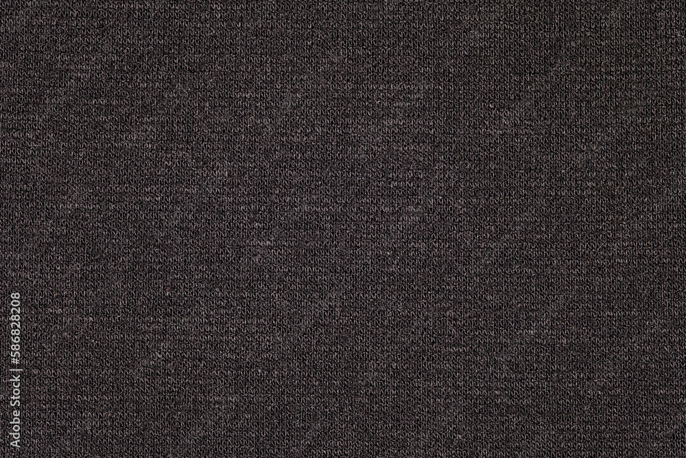 Fabric black knitted close-up, background wallpaper, uniform texture pattern