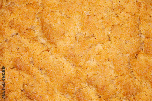 Oatmeal cookies structure close-up, macro view, uniform texture background