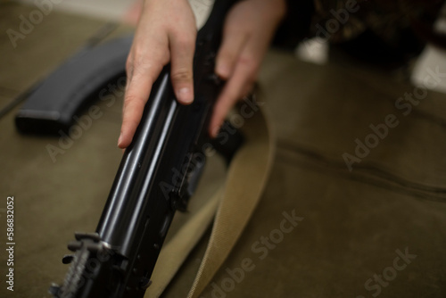 Handling of weapons. Military training. Assembly of Russian assault rifle. Training weapons.