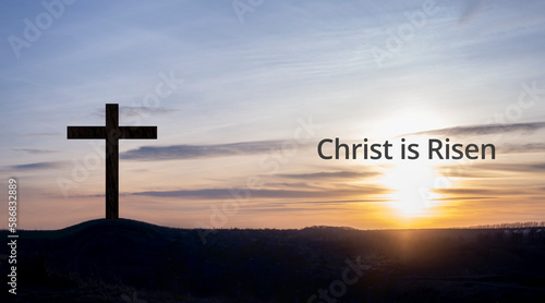 Cross. Crucifixion on the mountain on the background of the sunset sky. Forgiveness of sins and repentance. God's love on Calvary. Easter. Christ is Risen!