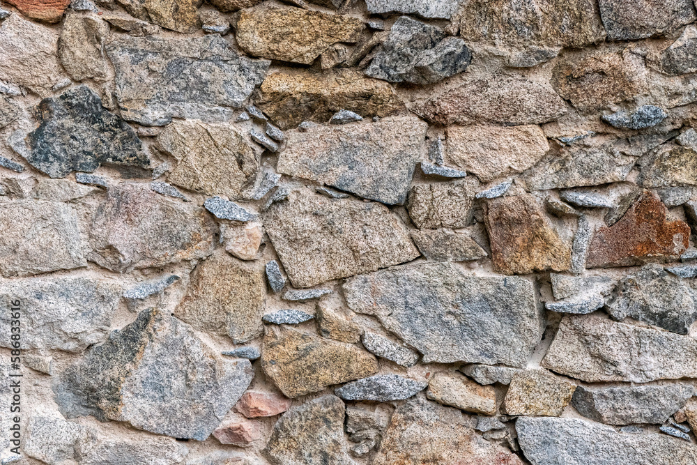 The surface of the ancient masonry of natural stones. The surface of the ancient masonry of natural stones.