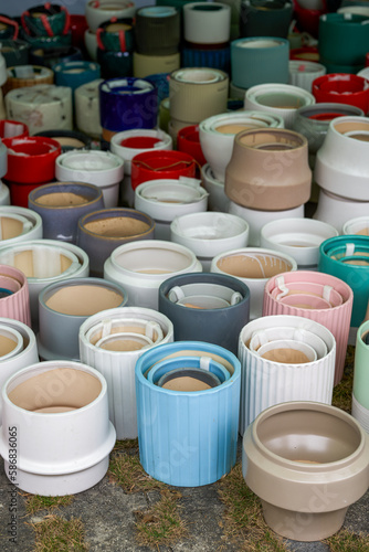 Stacks of various flowerpots for sale at the flower market