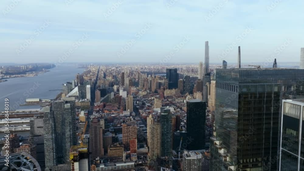 Drone shot over Hudson yards, toward Hell´s Kitchen and the Upper West Side of Manhattan, sunny evening in New York, USA Drone shot over Hudson yards, toward Hell´s Kitchen and the Upper West Side of Manhattan, sunny evening in New York, USA