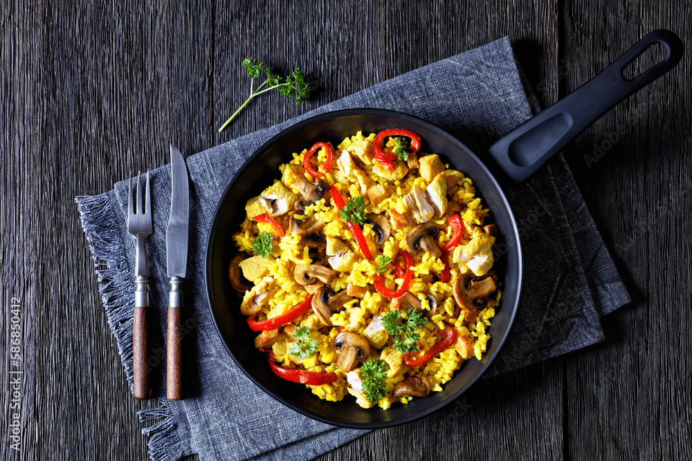 Chicken Paella with mushrooms, red pepper, spices Chicken Paella with mushrooms, red pepper, spices