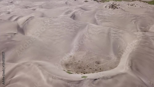 Drone flight over sand dunes. photo