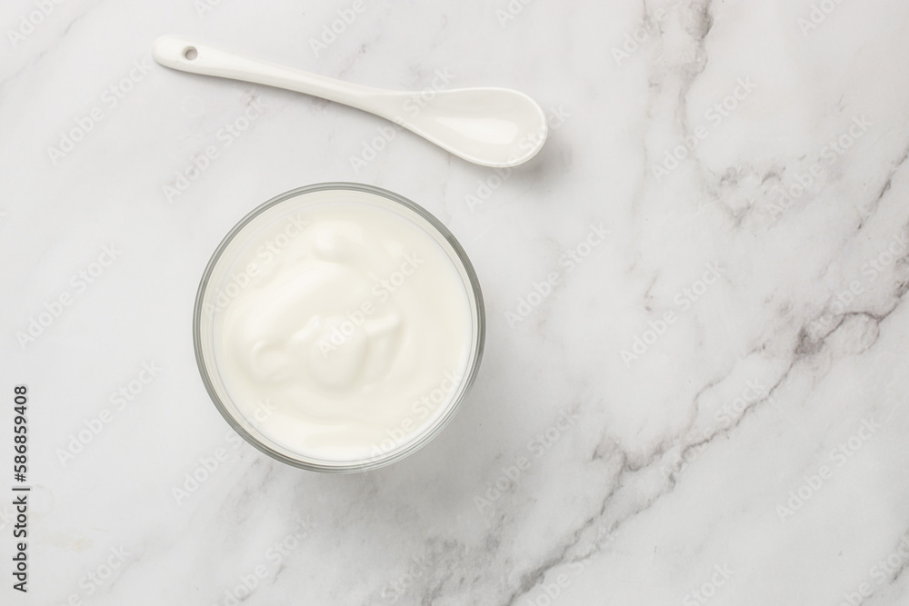 yogurt on a light background, Probiotic cold fermented dairy drink. place for text yogurt on a light background, Probiotic cold fermented dairy drink. place for text