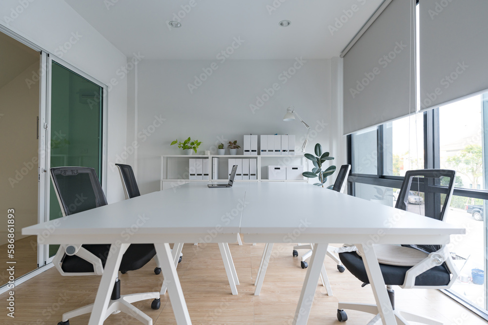 An interior of a modern home office, a small business that is just getting off the ground. An interior of a modern home office, a small business that is just getting off the ground.