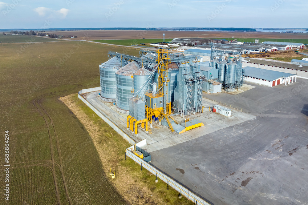 aerial panoramic view on agro-industrial complex with silos and grain drying line aerial panoramic view on agro-industrial complex with silos and grain drying line
