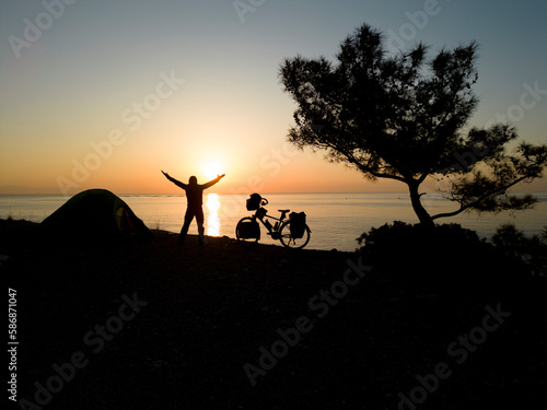 the pleasure of being on the road with a magnificent sunrise and a bicycle