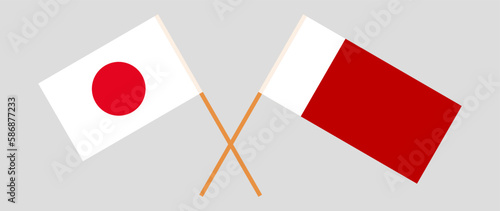 Crossed flags of Japan and Dubai. Official colors. Correct proportion