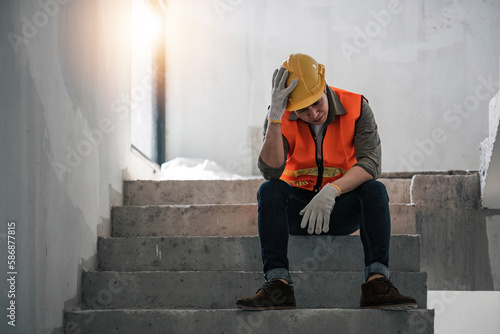 Obraz na plátně Stress engineer or architect holding hands at his head