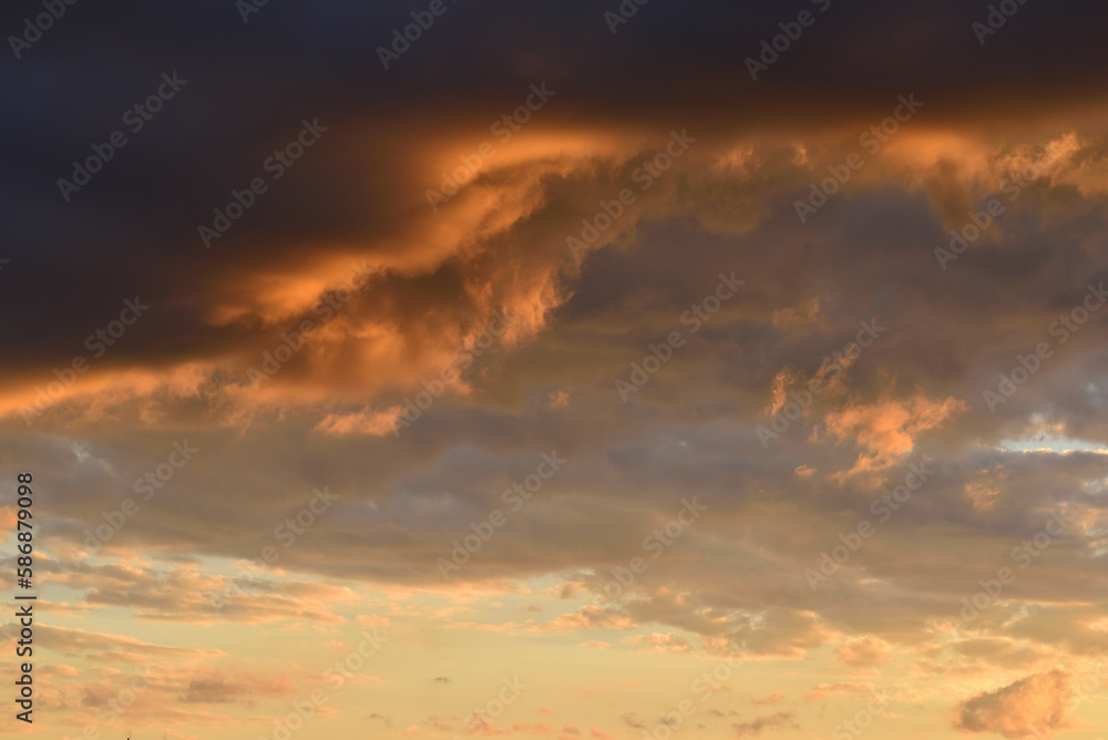 Amazing clouds in the sky during sunset, natural background