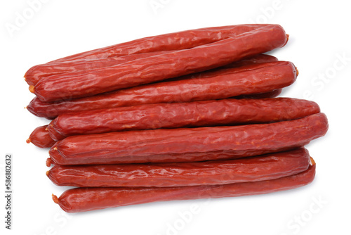 Delicious smoked sausages isolated on white, top view