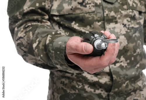 Soldier holding hand grenade on white background. Military service