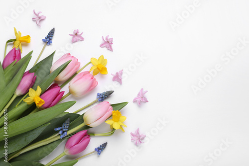 Fototapeta Naklejka Na Ścianę i Meble -  Beautiful flowers on white background, flat lay. Space for text