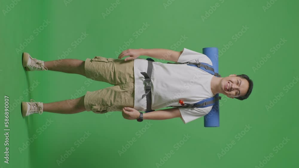 Full Body Of Asian Male Hiker With Mountaineering Backpack Smiling To Camera While Standing On Green Screen Background In The Studio
Full Body Of Asian Male Hiker With Mountaineering Backpack Smiling To Camera While Standing On Green Screen Background In The Studio