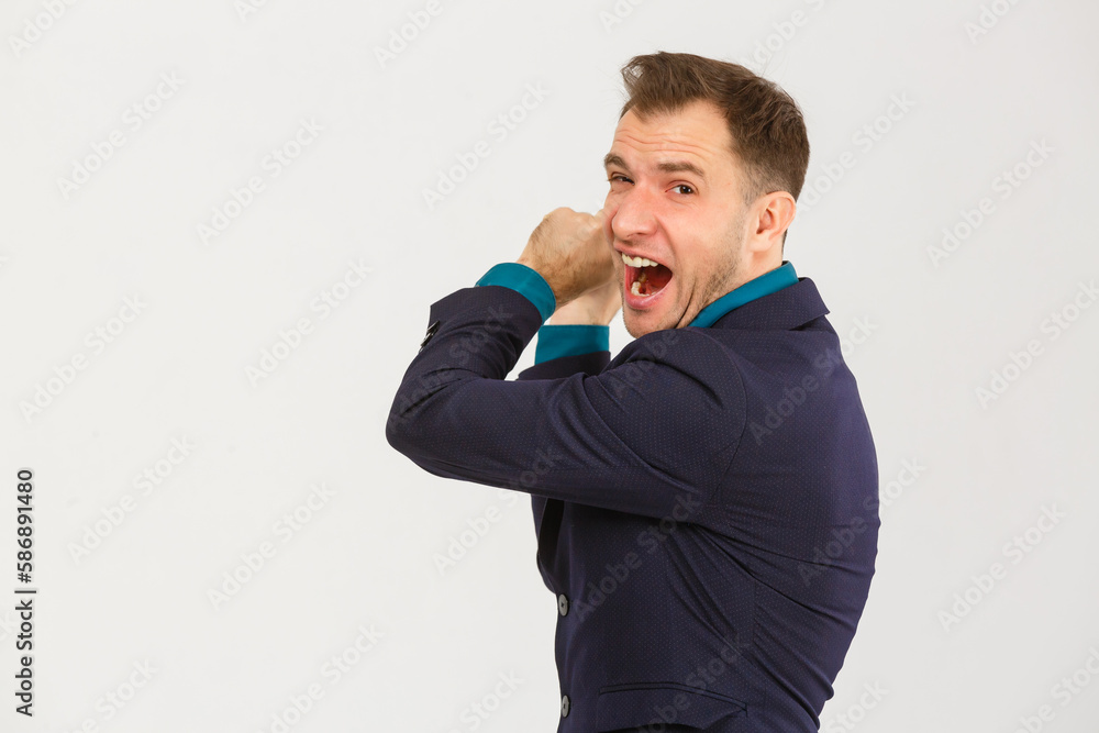 a man makes a fist on a white background a man makes a fist on a white background