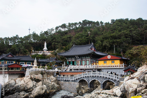 View landscape along coastline and Haedong Yonggungsa temple for korean people travelers travel visit respect praying blessing wish buddha at Gijang on February 18, 2023 in Busan or Pusan, South Korea photo