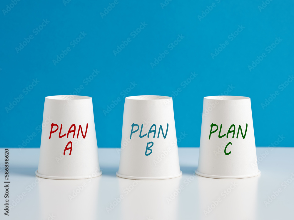 To find and choose the best and appropriate plan. Business plan options and alternatives. Three paper cups with the words plan a, plan b and plan c To find and choose the best and appropriate plan. Business plan options and alternatives. Three paper cups with the words plan a, plan b and plan c