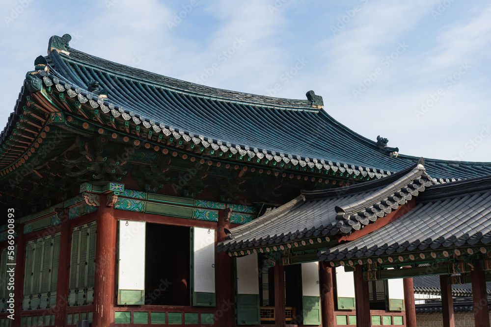 Changdeokgung Palace and Seonjeongjeon with Blue Tile roof in Seoul during winter morning at Jongno , Seoul South Korea : 3 February 2023