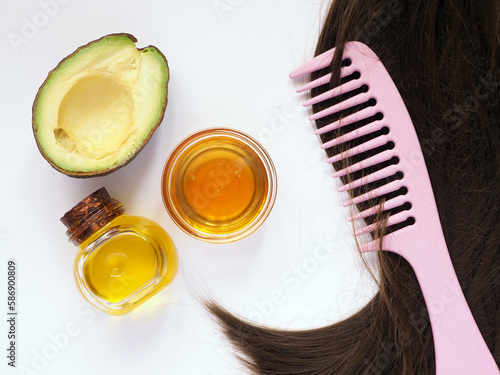 Ingredients for homemade hair mask: cosmetic oil, honey, avocado