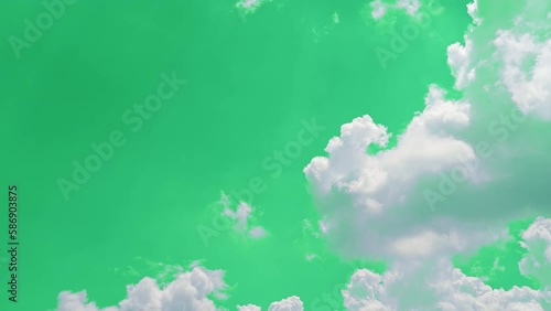 The green screen of moving white clouds with 4K resolution. Can use to change the background color.	
