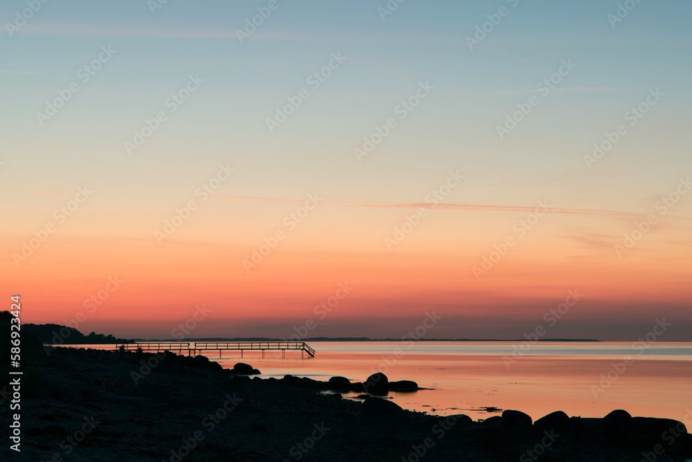 Scandinavian sunset,  orange sky, silhouette
