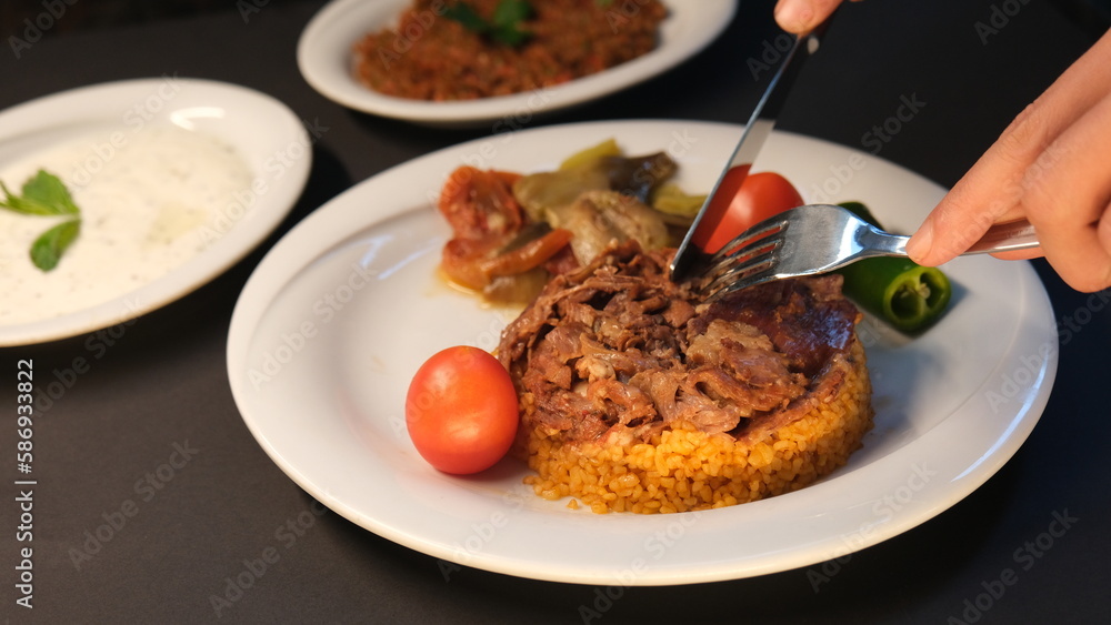Stuffed lamb with appetizers on the presentation plate Stuffed lamb with appetizers on the presentation plate