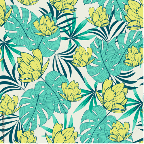 Summer seamless tropical pattern with bright plants and flowers on a pastel background. Seamless exotic pattern with tropical plants. Beautiful exotic plants. Exotic jungle wallpaper.