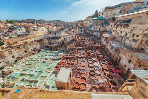 Shuara leather dyers in Fes. People dye leather products photo