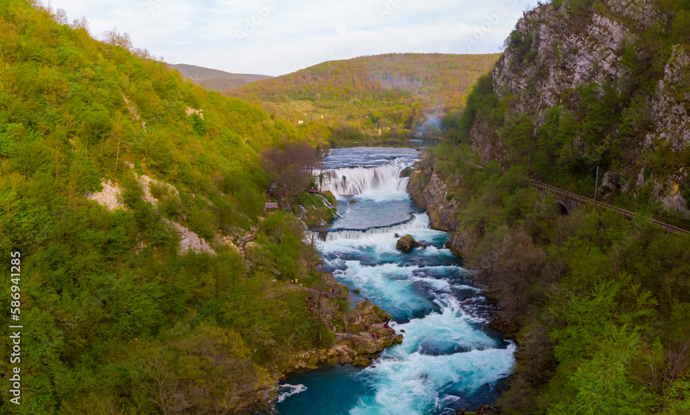Strbacki buk (strbaki buk) waterfall is a 25 m high waterfall on the Una River. It is greatest waterfall in Bosnia and Herzegovina Strbacki buk (strbaki buk) waterfall is a 25 m high waterfall on the Una River. It is greatest waterfall in Bosnia and Herzegovina