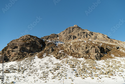 Snow covered mountain panorama on the Julier pass in Switzerland