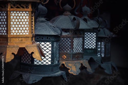 Temple lanterns at Kasuga Taisha, the Lantern Shinto shrine in Nara, Japan. Nara was once the ancient capital of Japan, and the temple dates back to 768 AD.