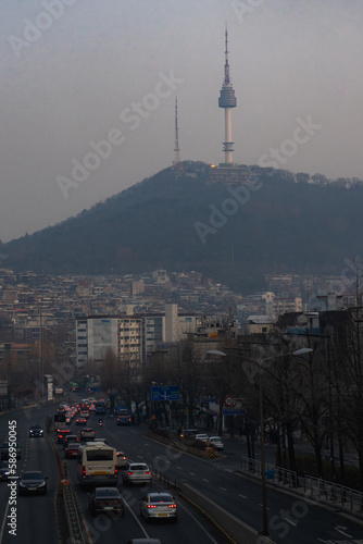 Cityscape of Seoul Namsan Tower from Noksapyeong Bridge near Itaewon street during winter morning at Yongsan-gu , Seoul South Korea : 6 February 2023 photo