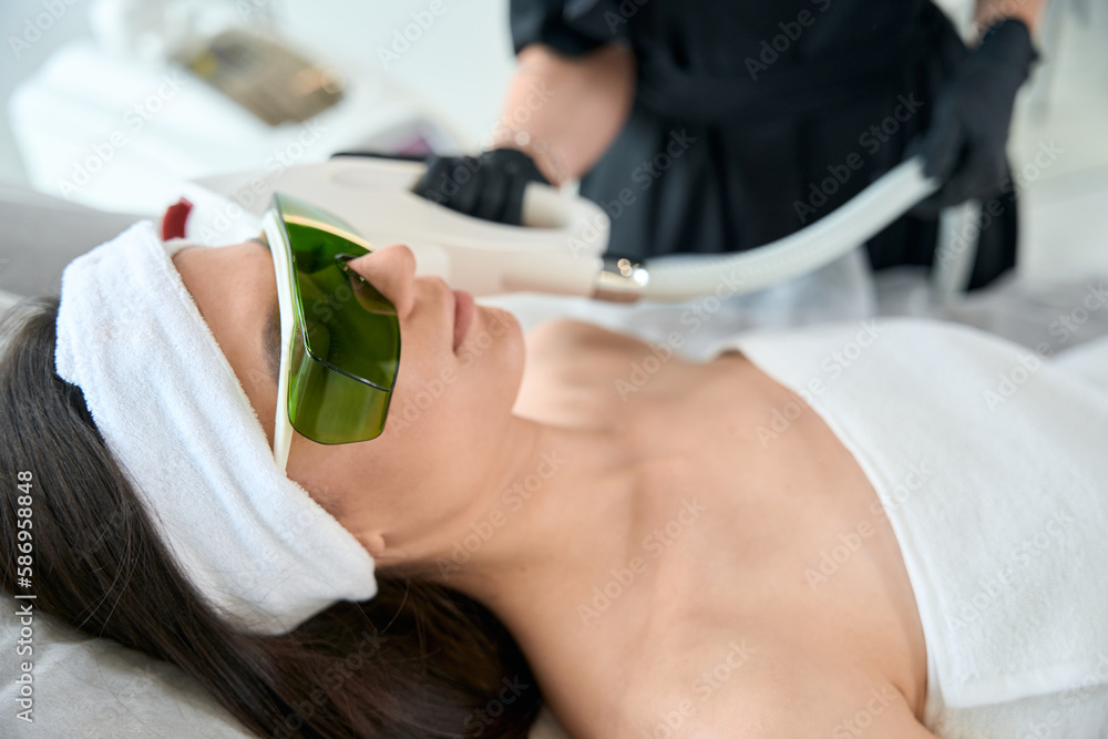 Lady on armpit laser hair removal procedure Lady on armpit laser hair removal procedure