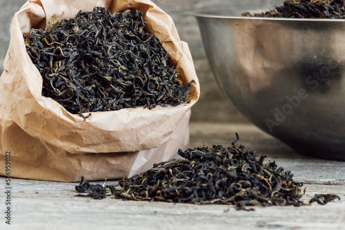 tea scattered on a wooden background. High quality photo ivan photo