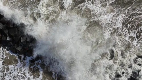Elmer beach breakwater. Bognor Regis. South of England. Cinematic drone flight photo