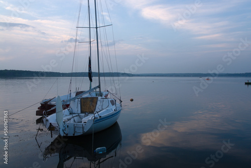 sailboat at sunset © Andrey