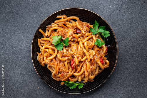 noodles with vegetables tomato sauce ready to eat healthy meal food snack on the table copy space food background rustic top view veggie vegan or vegetarian food no meat
