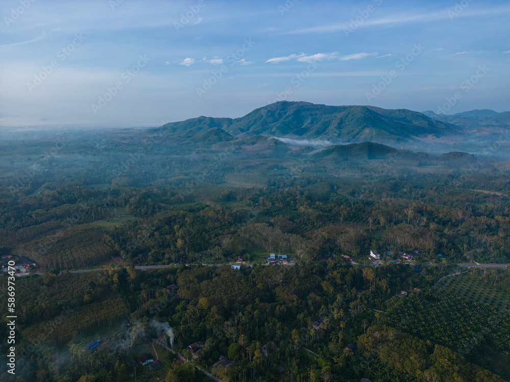 Fototapeta premium Aerial view morning sunrise with fog river mountain