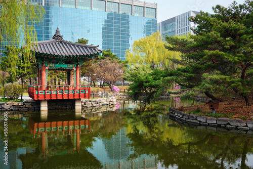 Yeouido Park public park pond with pavilion summerhouse in Seoul, Korea