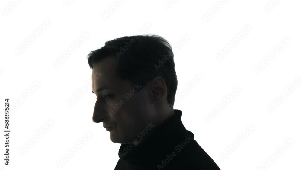 The man in the black sweater looks ahead. Sadness. Fatigue. Emotional facial expression The man in the black sweater looks ahead. Sadness. Fatigue. Emotional facial expression